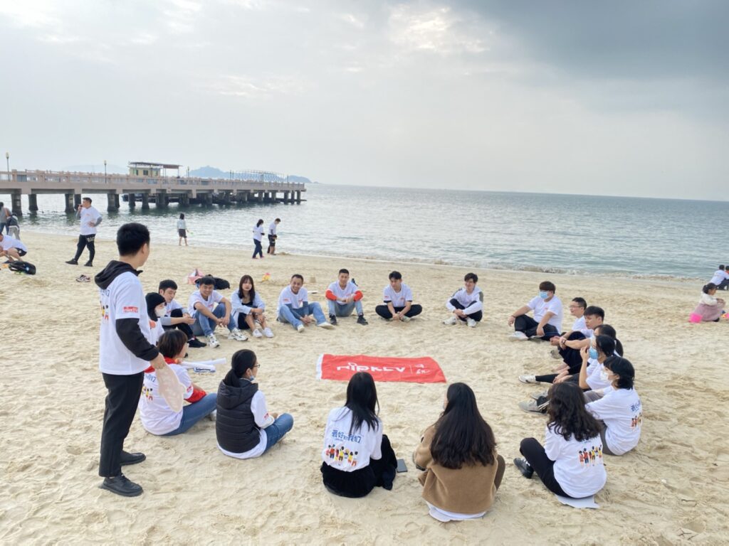 Team outdoor activities on beach in Huizhou