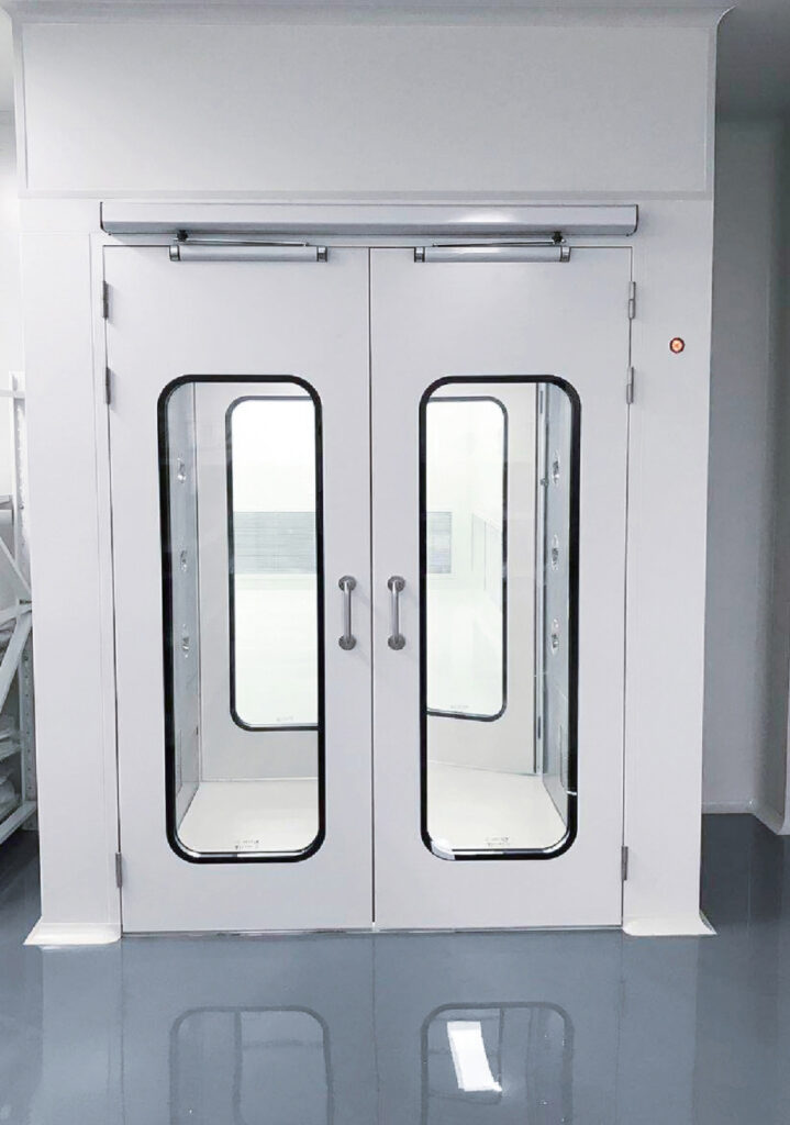 Custom swing door for air shower